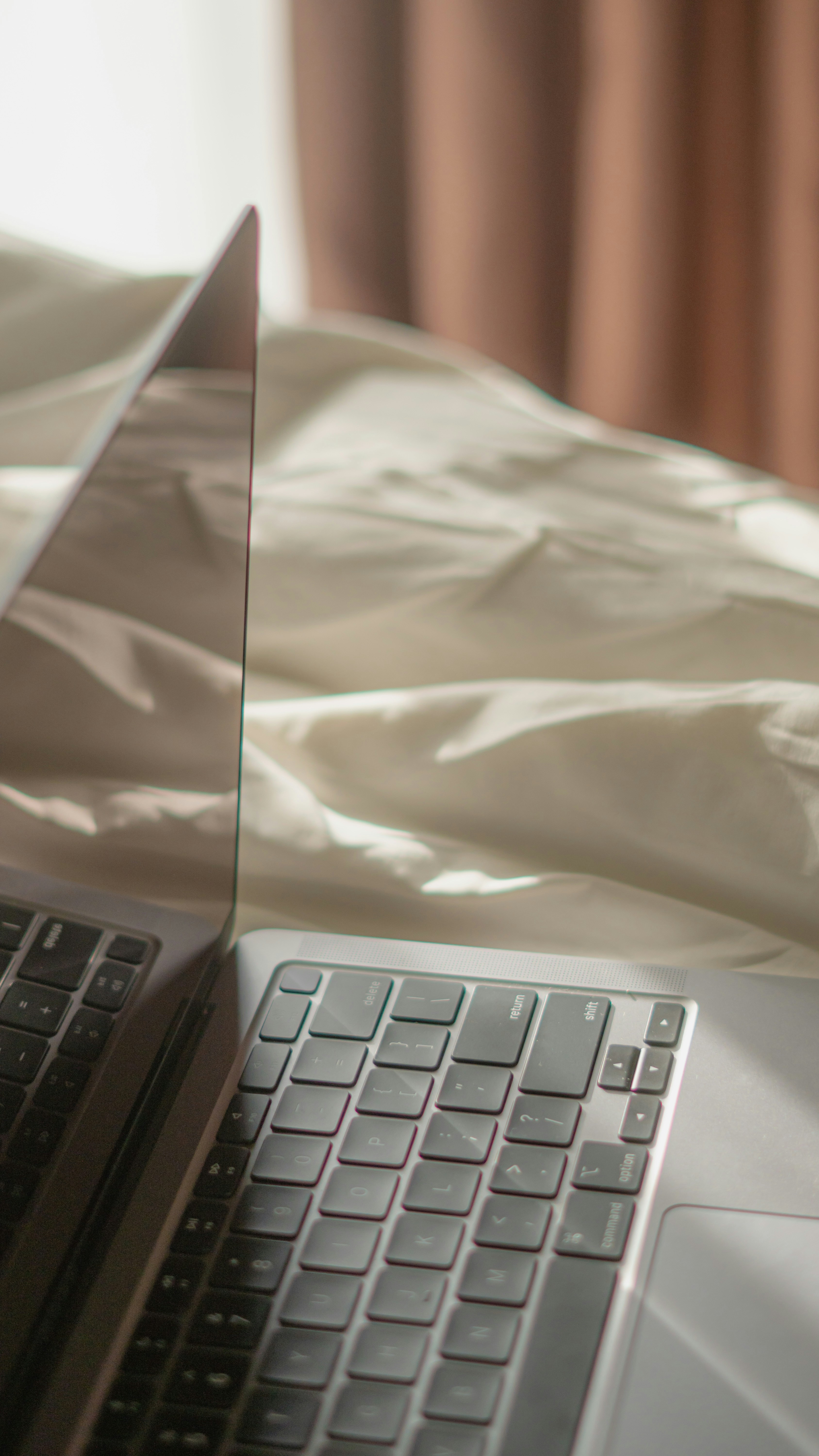 laptop on bed
